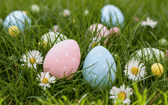 Two easter eggs in the grass