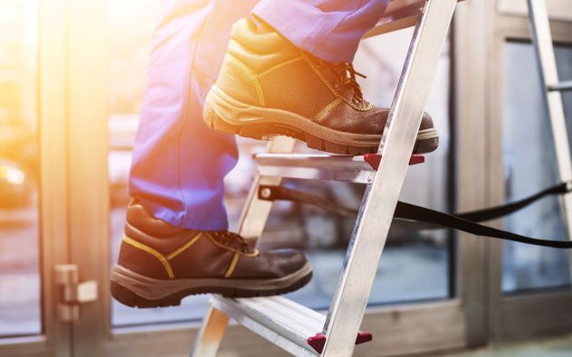feet climbing a ladder