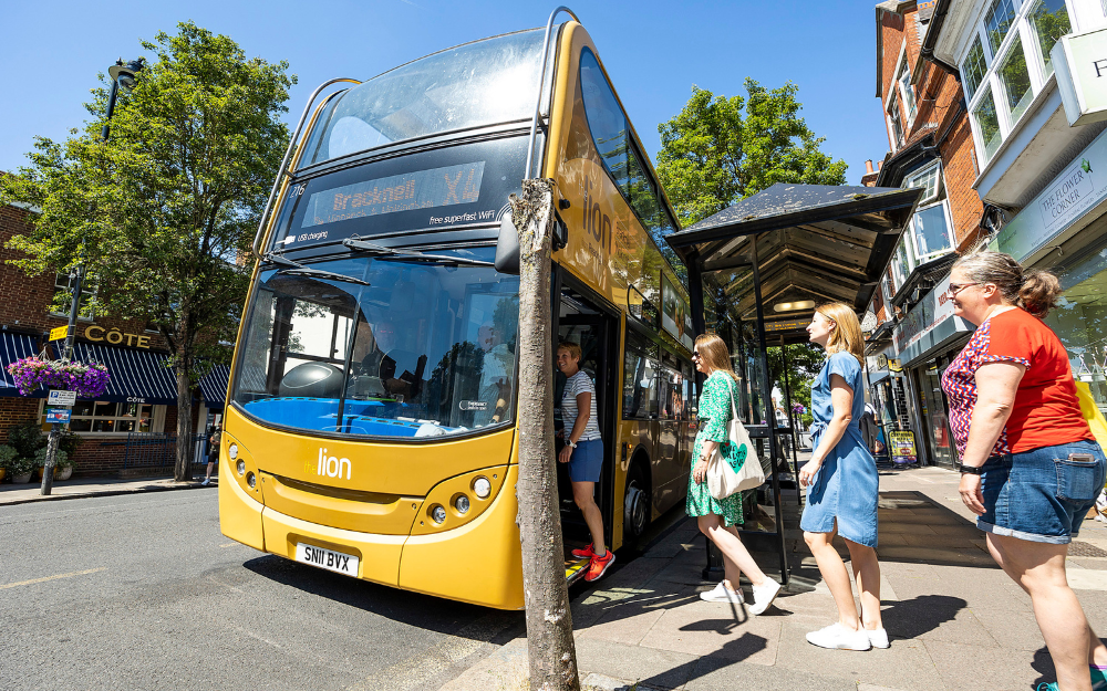 People queuing to get onto the bus in Wokingham