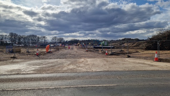 the entrance to a Balfour Beatty site off Easthampstead Road with signage and wire metal fencing to either side