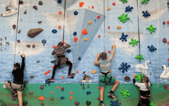 Children climbing the indoor wall at Dinton Pastures