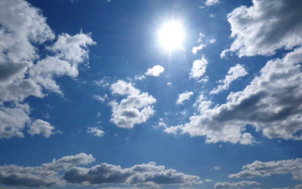 Sunny sky with clouds