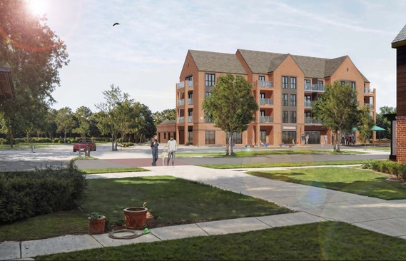 a four-storey neighbourhood centre building with shop units on the ground floor and flats above