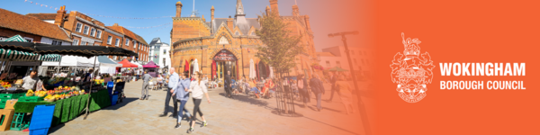 People walking past a market stall in Market Place in Wokingham town