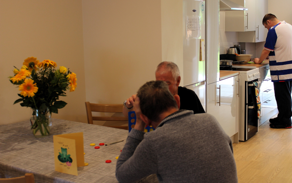 Men in their renovated home