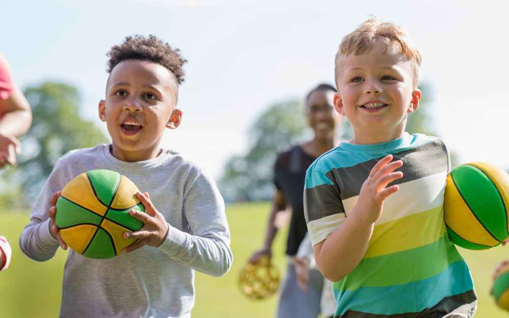 Children running with ball