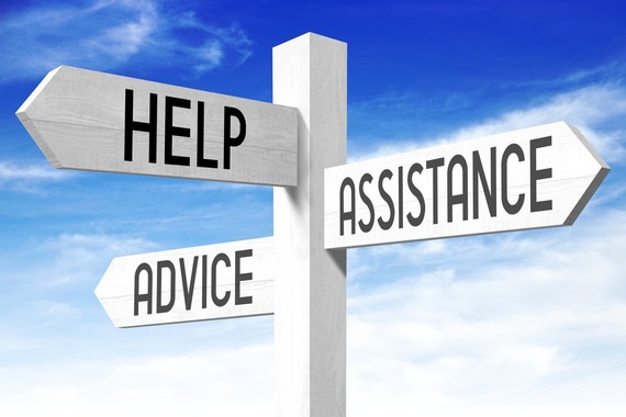Image of signpost with three directions - help, assistance and advice