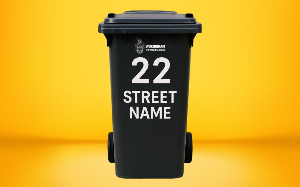 A wheelie bin with the label, 22 Street Name, on it