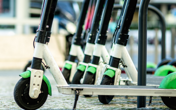 A row of electric scooters