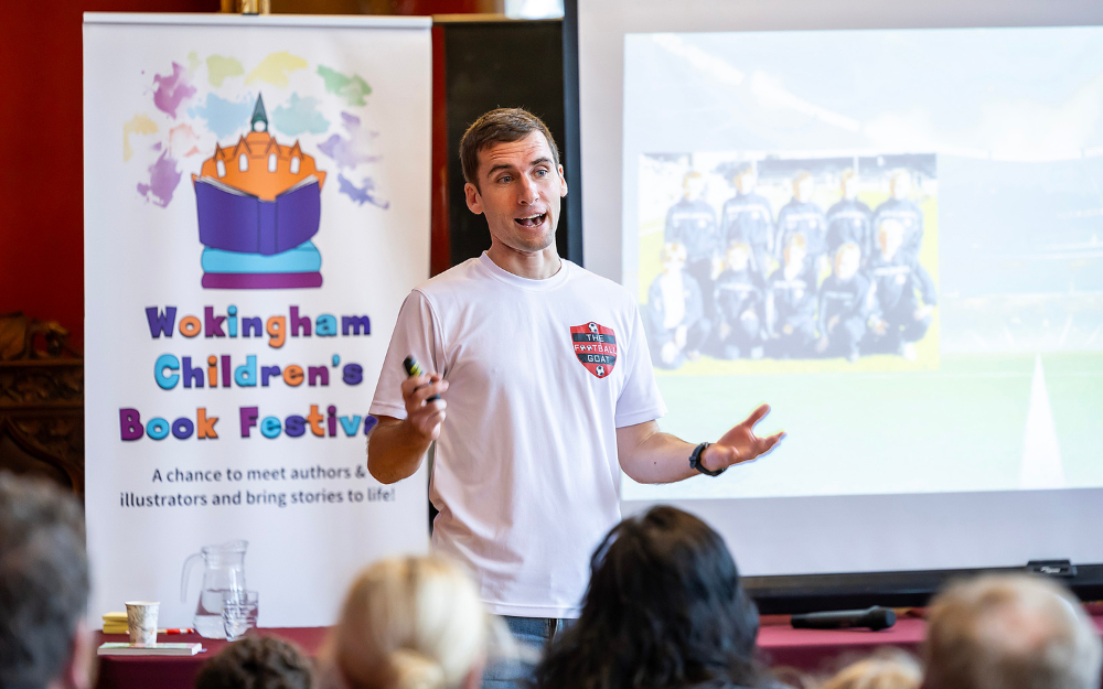 An author speaks during Wokingham Children's Book Festival at Wokingham Town Hall