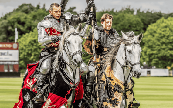 Two people on two horses