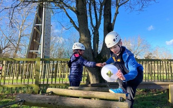 Two children taking part in a Wild Days activity