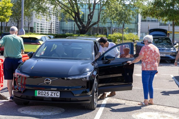 People looking at EV