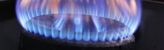 close up of flames coming from a ring on a gas hob