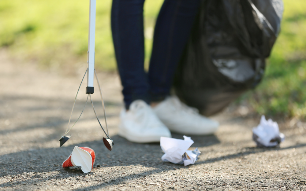Litter being collected using a pick and rubbish bag