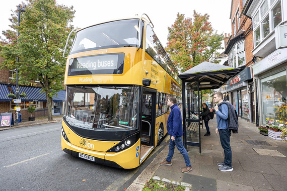 people boarding the lion 4 bus at a covered shelter in Wokingham town centre