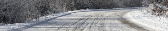 banner image showing a frozen country road stretching out into the distance