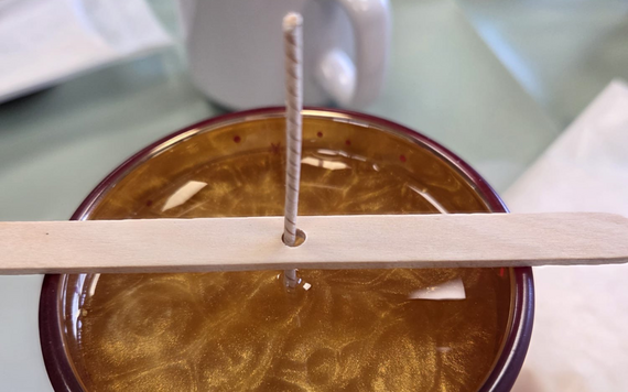 A candle being made