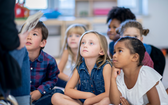 Group of children listening to a story
