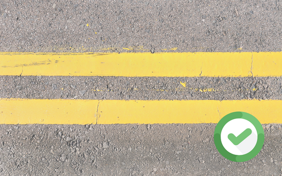 double yellow lines painted on road