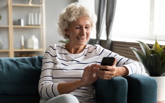 Older woman looking at her smart phone