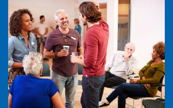 A group of people talking together