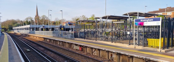 wide view of Wokingham station platform with bus stop, cycle store and other improvements