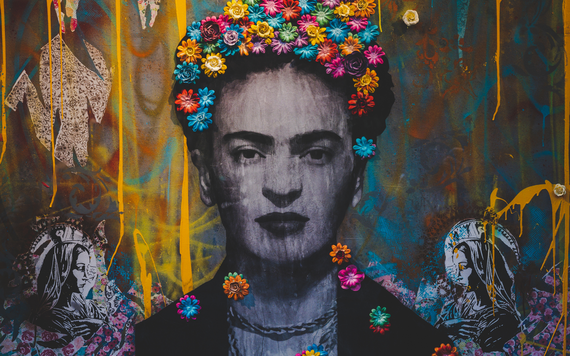 A graffiti style painting of Frida Kahlo