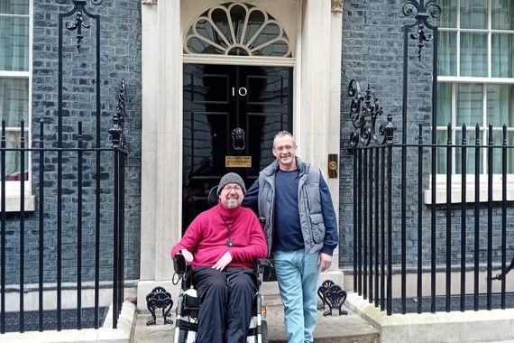 Image of Gregg smiling in front of 10 Downing Street