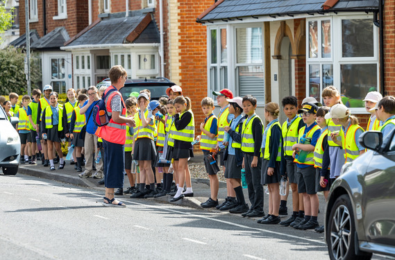 Group of children and teachers on a led walk