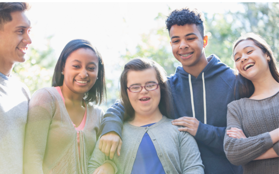 A group of teenagers smiling 