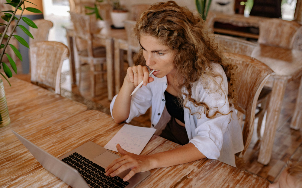 general view woman at laptop