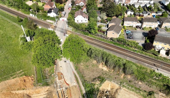 aerial view of the railway line crossed a closed section of Easthampstead Road outside Wokingham