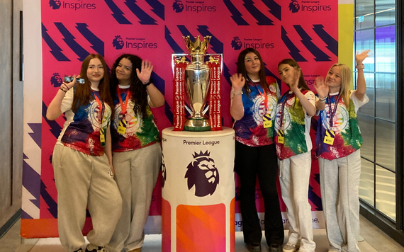 Students from The Emmbrook School, stood with a trophy