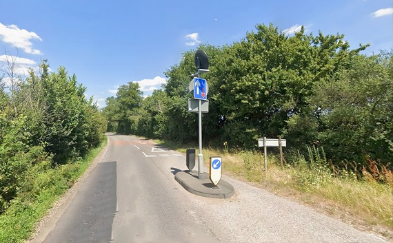 a traffic calming build-out on a rural road near Arborfield, on a sunny day