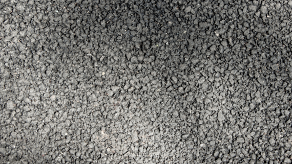 close up on a fresh road surface with a coarse texture which is good for tyre grip