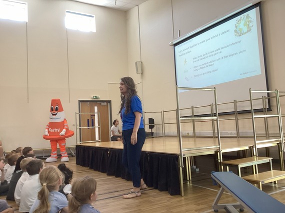 My Journey and Kerby from Volker Highways delivering an assembly about Clean Air Day and launching our anti-idling competition