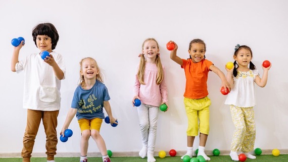 children playing with brightly coloured balls