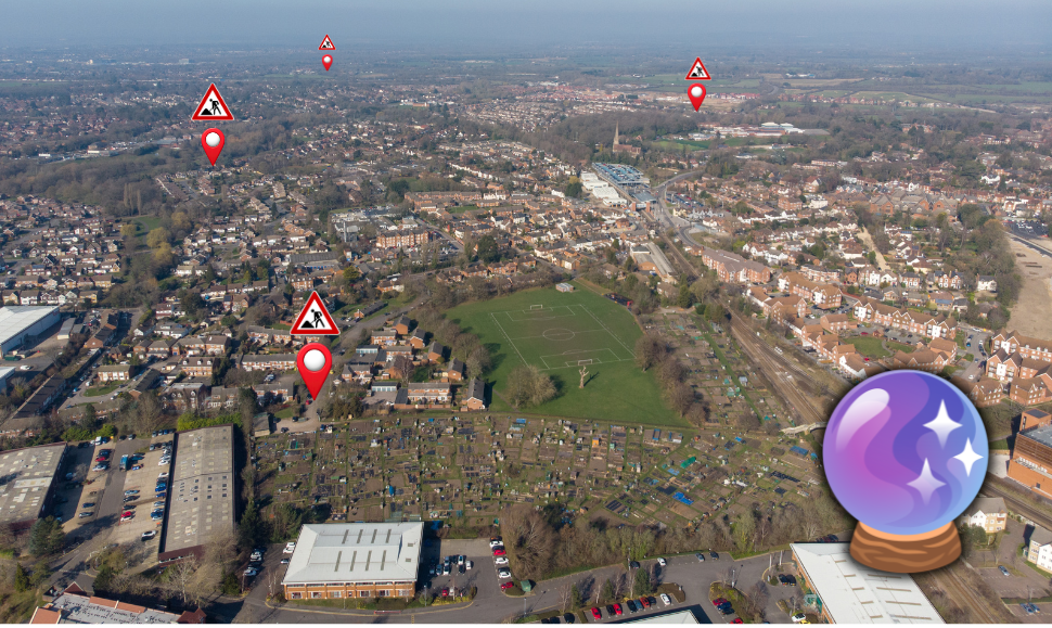Aerial image of the borough with a crystal ball and map pins where there are roadworks