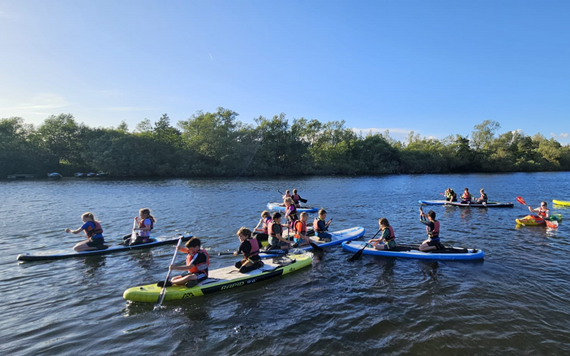 Children on the water in boats