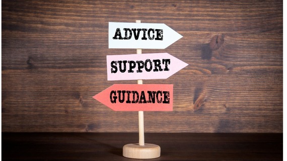 sign post showing 'advice', 'support' and 'guidance'