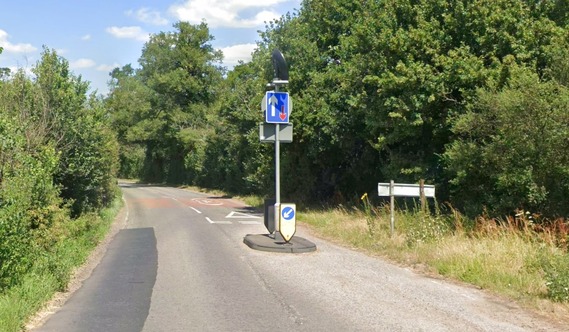a give way traffic island, or chicane, on a rural lane at Arborfield Cross which forces one lane to give way to the other