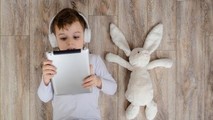 Boy with toy rabbit