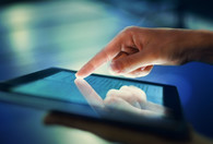 Finger on tablet