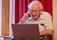 older man on PC
