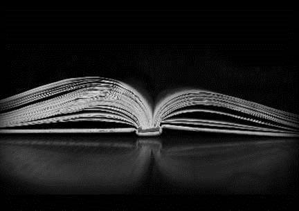 Black and white photograph of open book