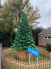 Christmas tree outside a library