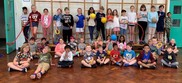 Children attending an activity club in a gym