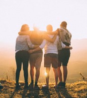 Teenagers embracing in the sunshine, summer support