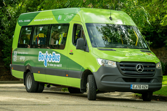 Book-a-Bus vehicle with green livery